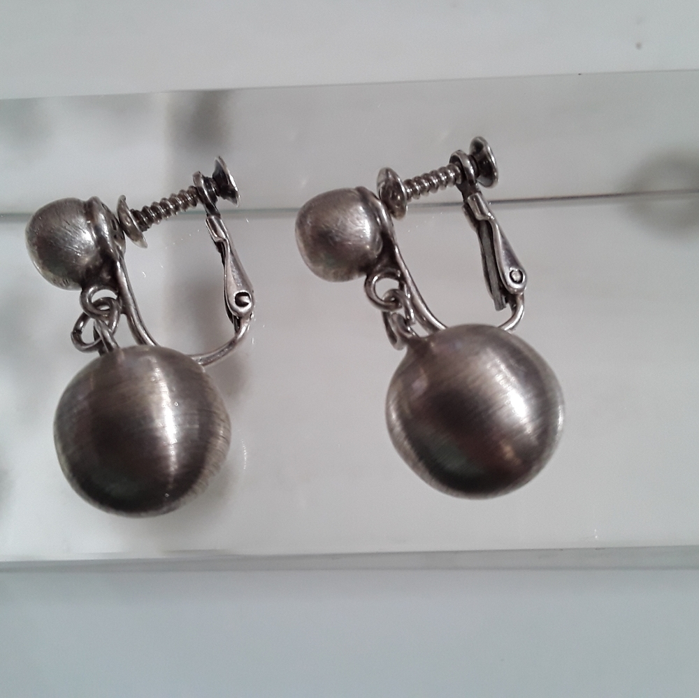 Earrings by SIGI TASCO